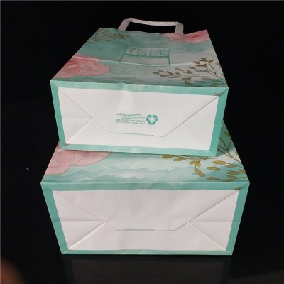 创意礼品袋设计 服装店外卖纸袋现货手提白牛皮纸袋 化妆品包装袋  100个图5